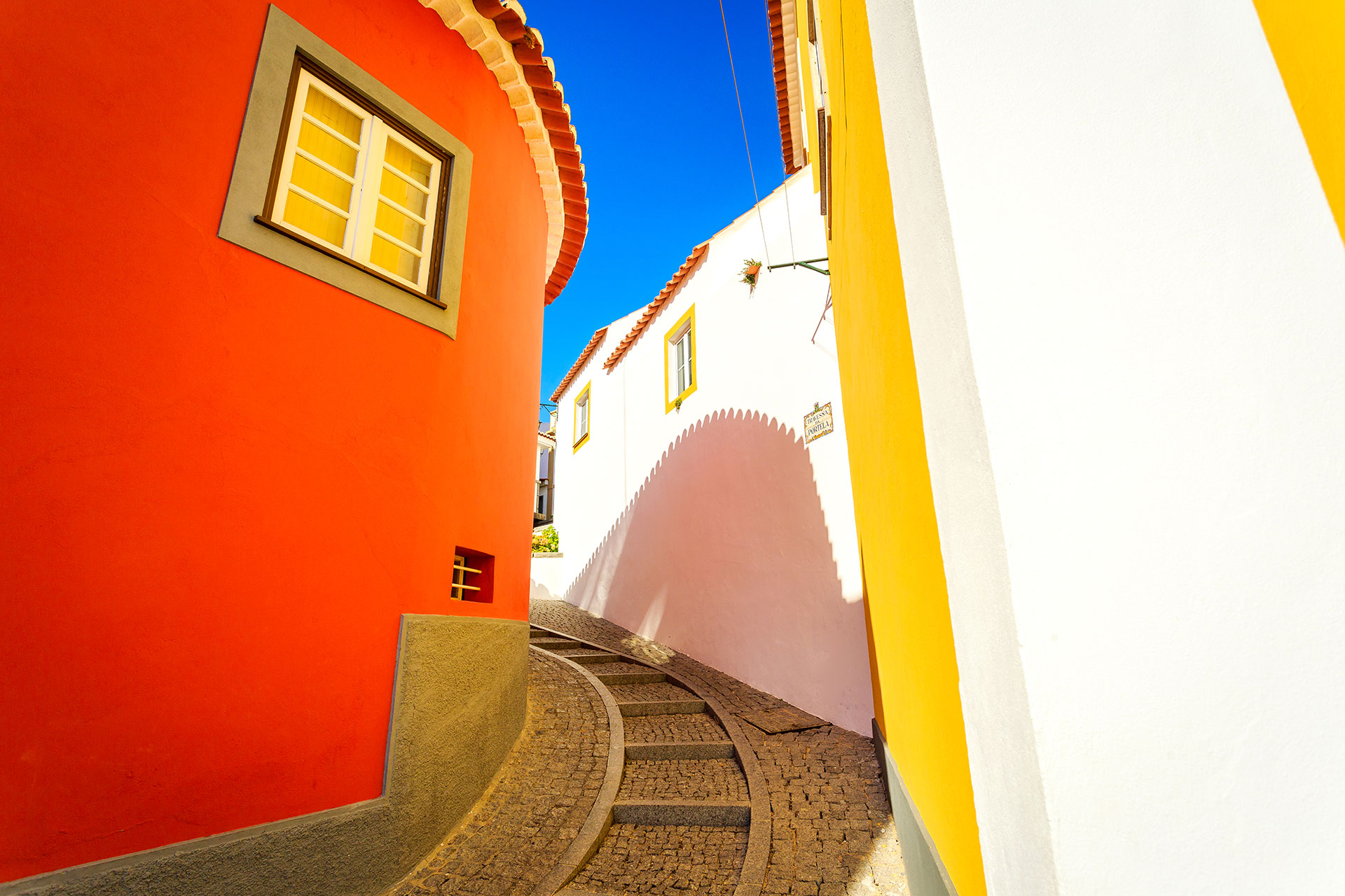 Charming street with colourful buildings in sunny Monchique