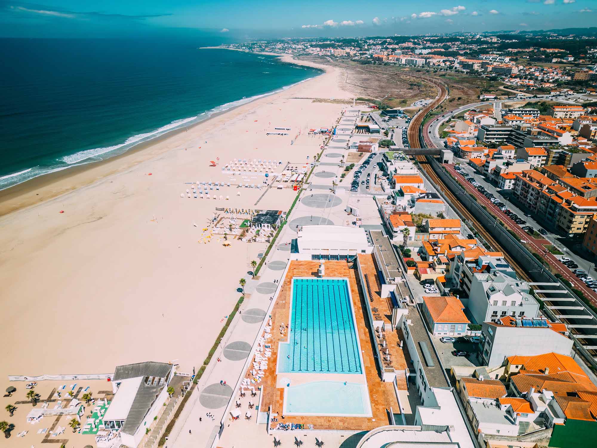 Aerial drone view of beach and promenade in Espinho, Portugal, 30km south of Porto