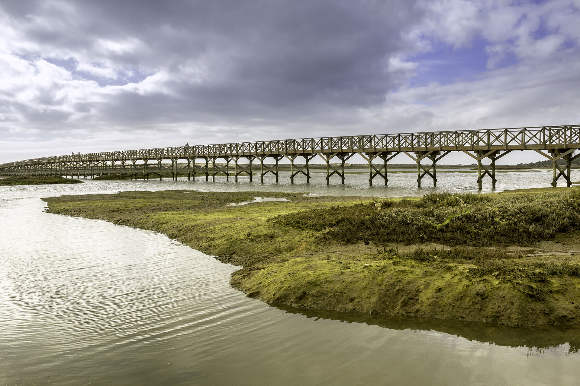 Landmark footbridge heading to the famous Quinta do Lago beach, in Ria Formosa