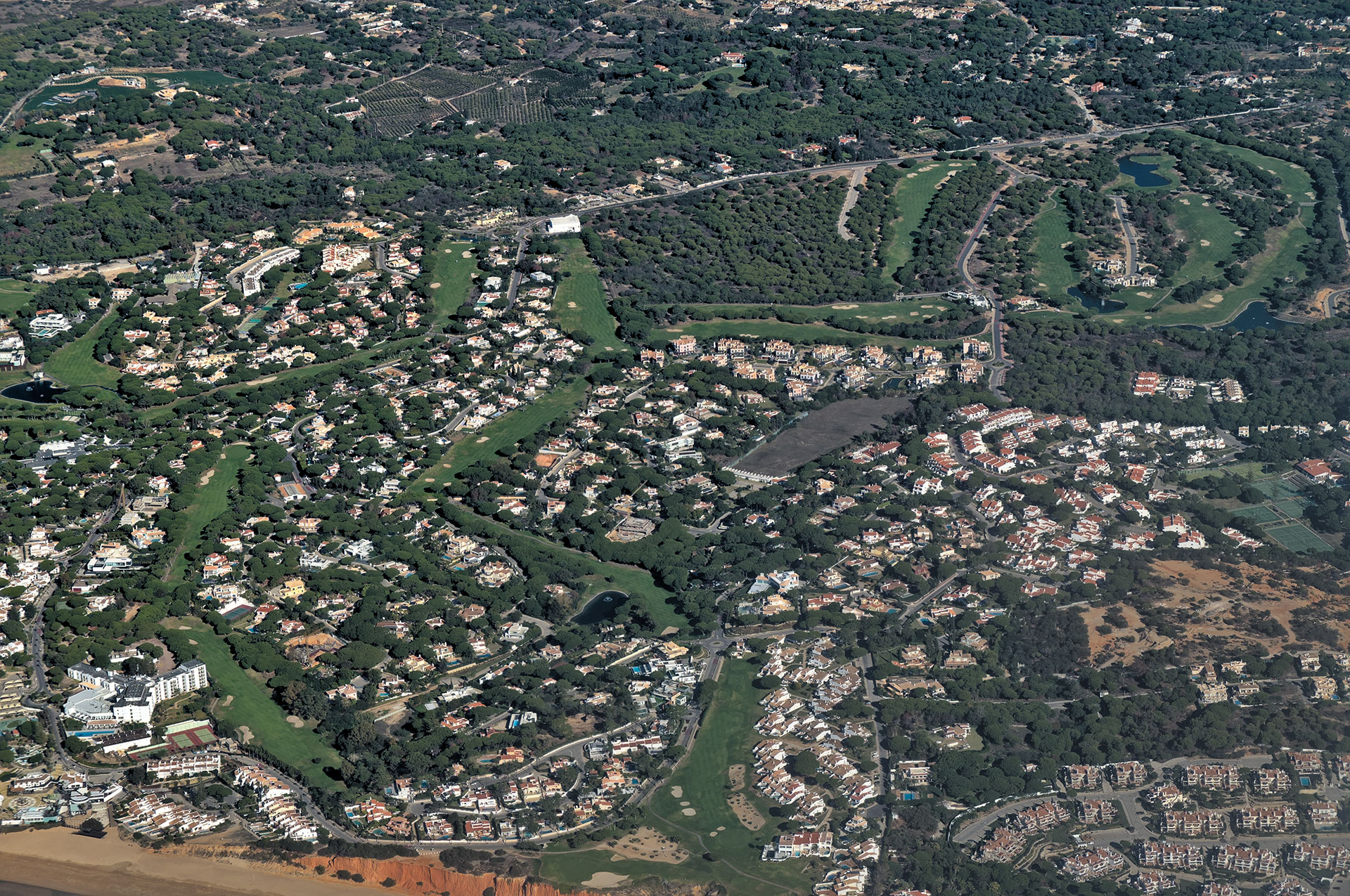 Aerial view of Almancil's luxury villas and golf courses