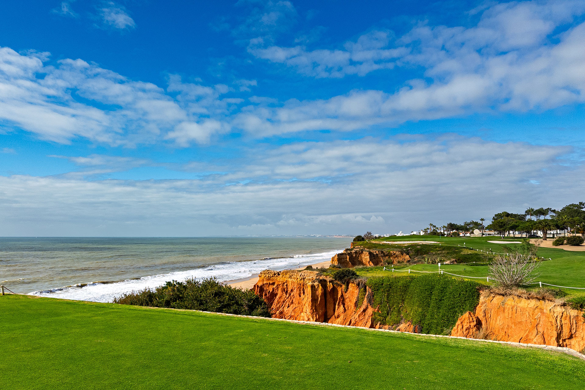 Panoramic views overlooking the golf course and ocean