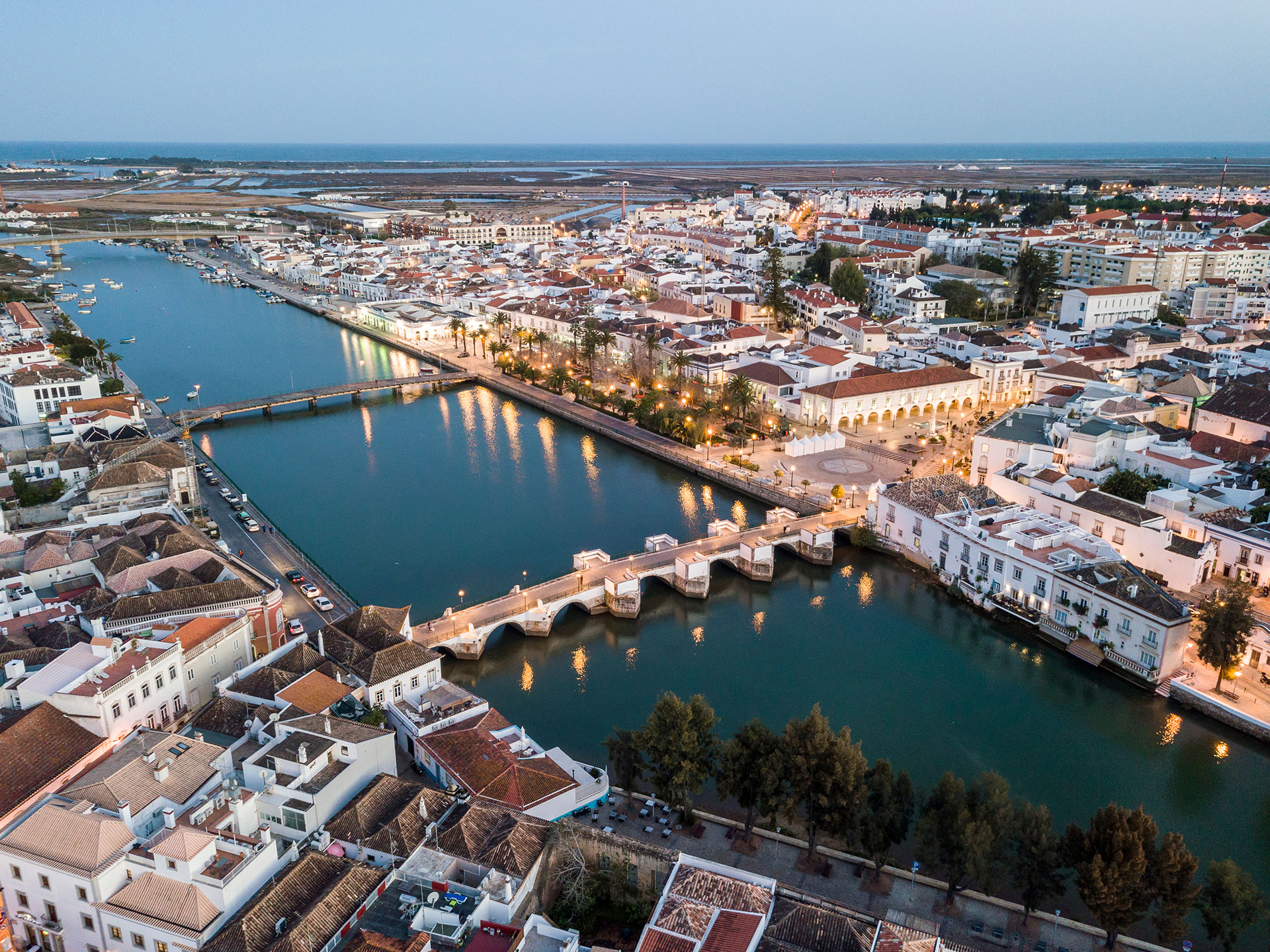 Aerial evening view of Tavira, with its traffic-free Roman stone bridge crossing the River Gilão