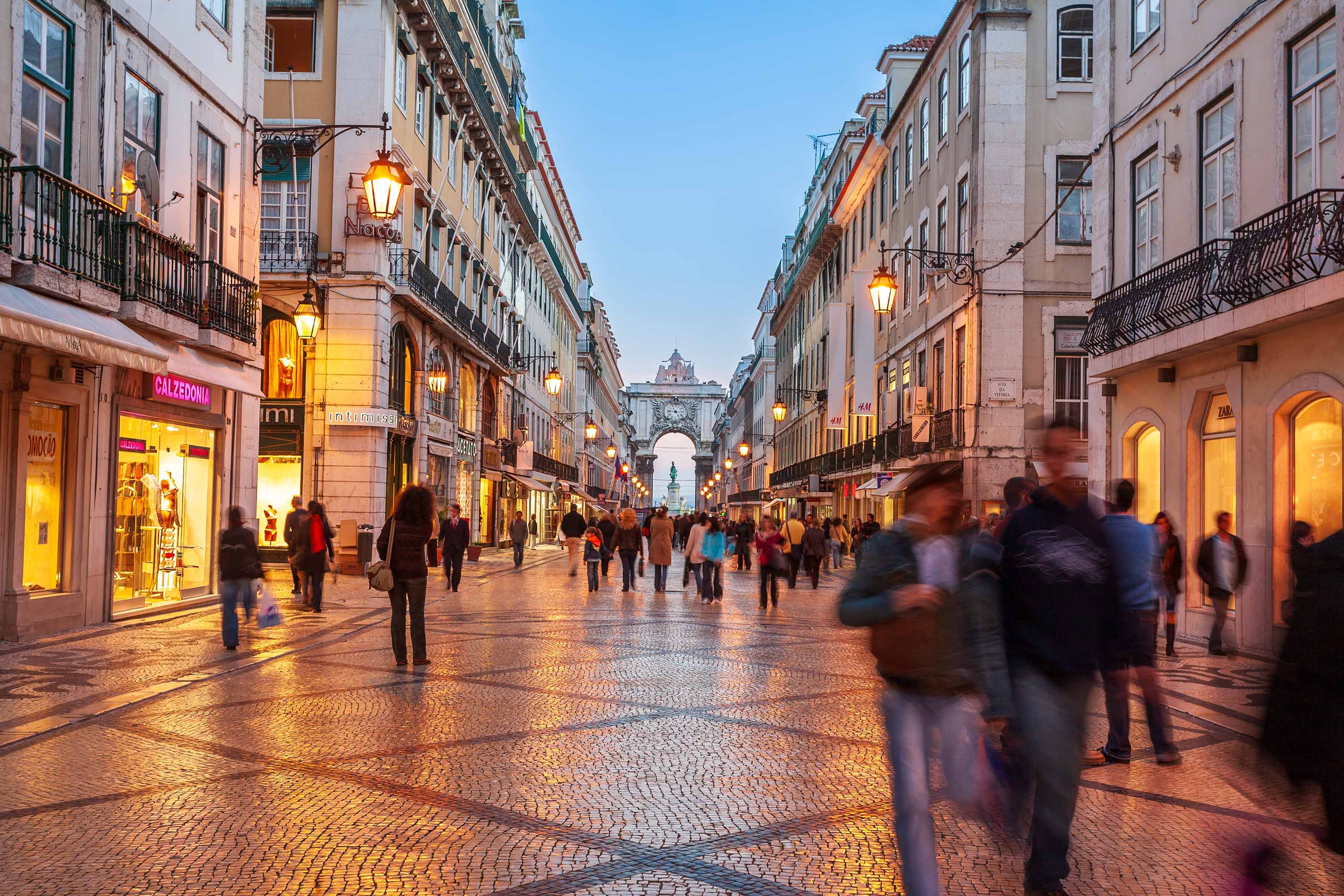 A shopping street at night in Baixa, Lisbon