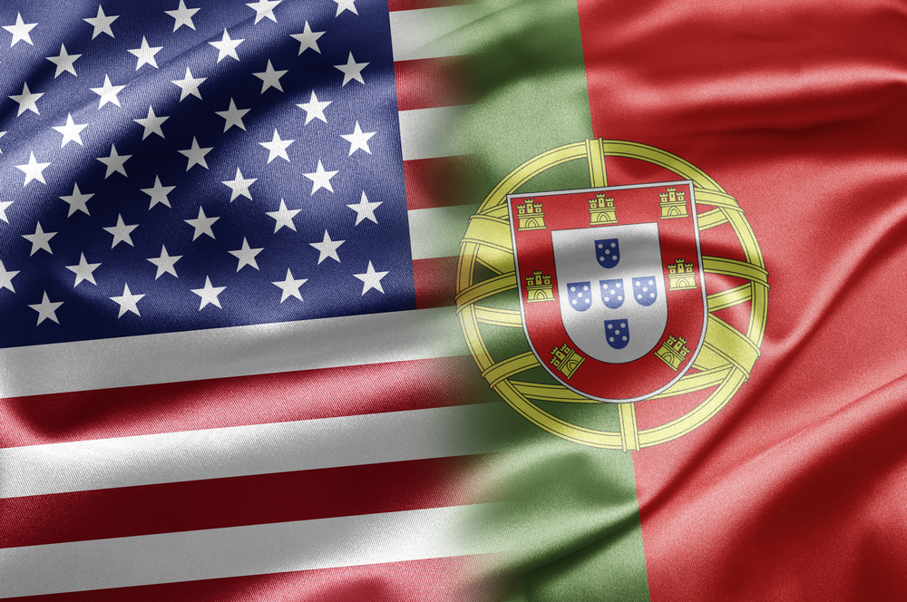 Image of the American Stars and Stripes flag blended subtly into a flag of Portugal