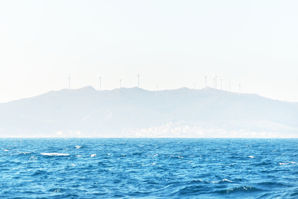 Atlantic Ocean view in Portugal with wind turbines