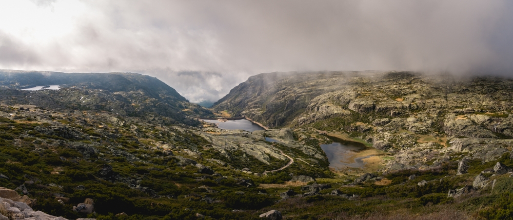 Cloudy view of the Albufeira de Covão do Meio reservoir in the Serra da Estrela National Park