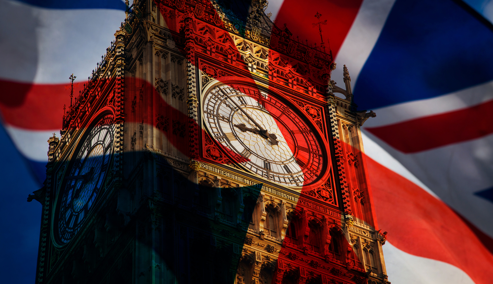 Big Ben clock tower in London overlaid with Union Jack flag
