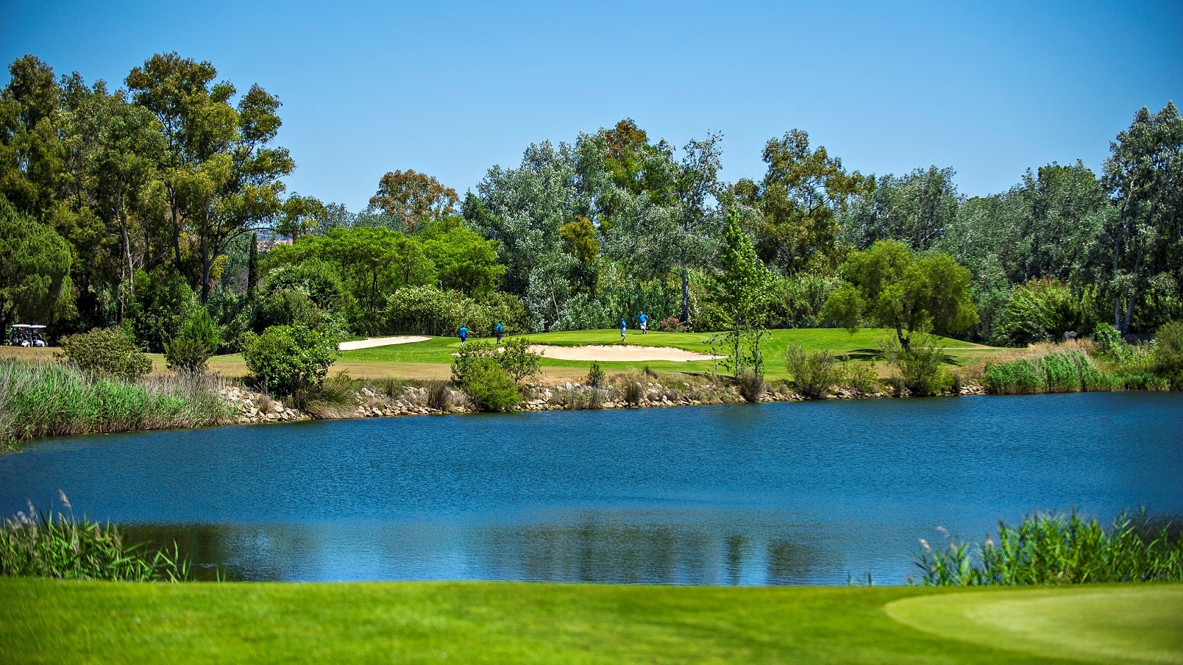 Golf hole featuring a water hazard at the picturesque Dom Pedro course, Vilamoura