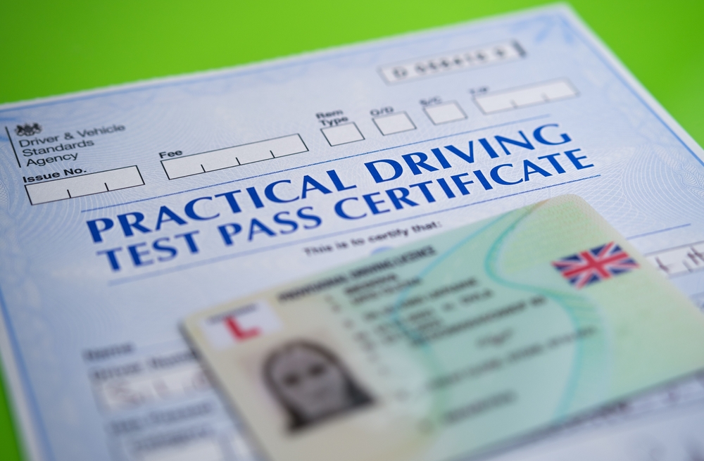 United Kingdom Practical Driving Test Pass Certificate form and a new physical driver's license