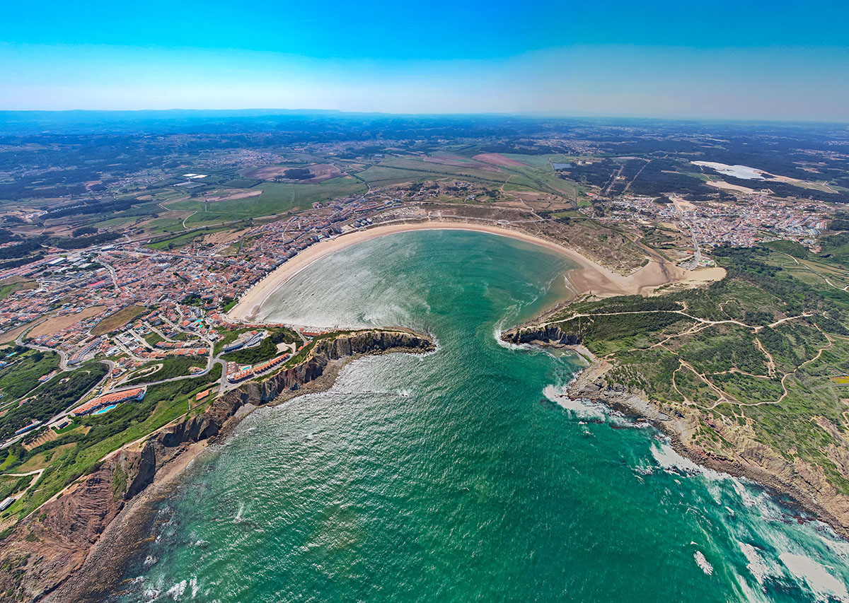 Stunning aerial image of the shell-shaped bay at São Martinho do Porto, Silver Coast