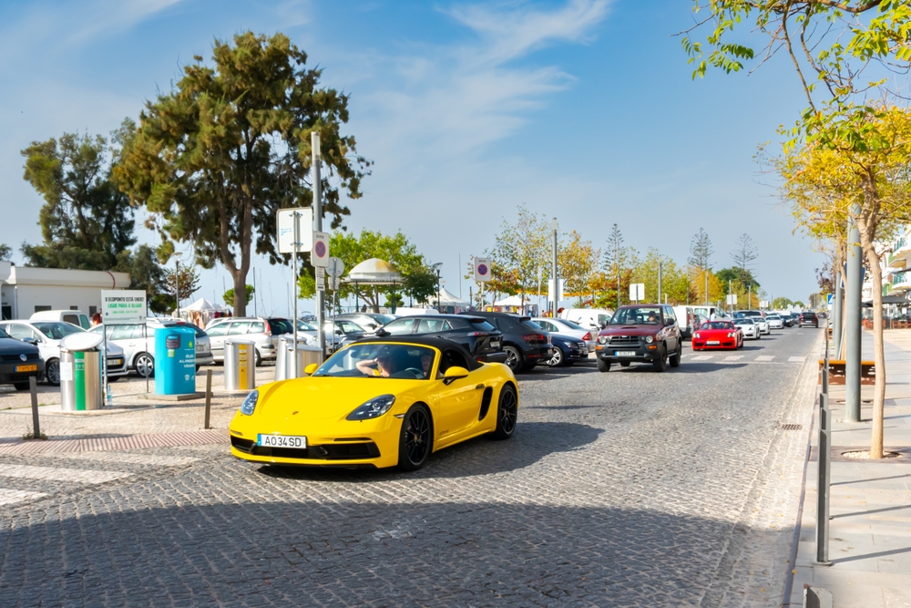 Yellow Porsche sports car in Portugal