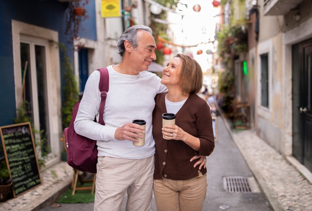 Elderly couple drinking coffee in Portugal