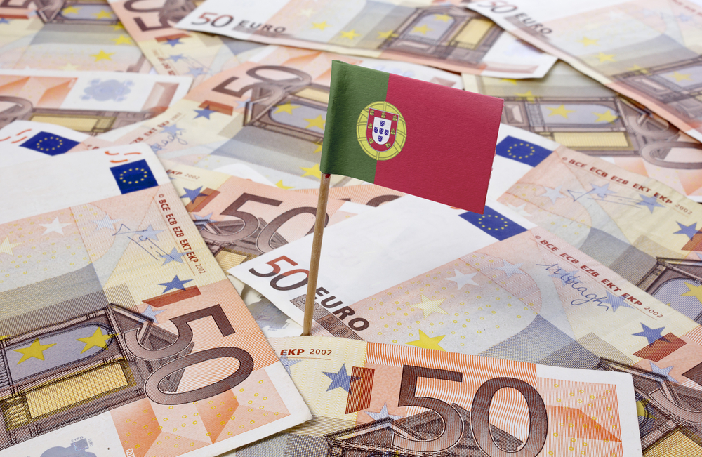 Portugal flag on top of euro notes