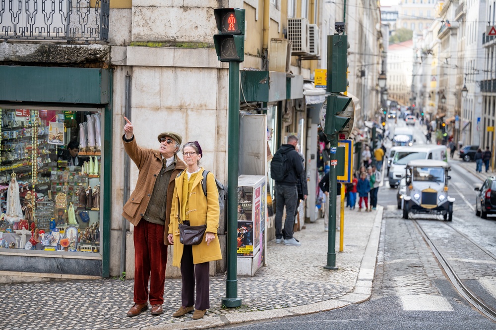 elderly couple exploring streets in Portugal