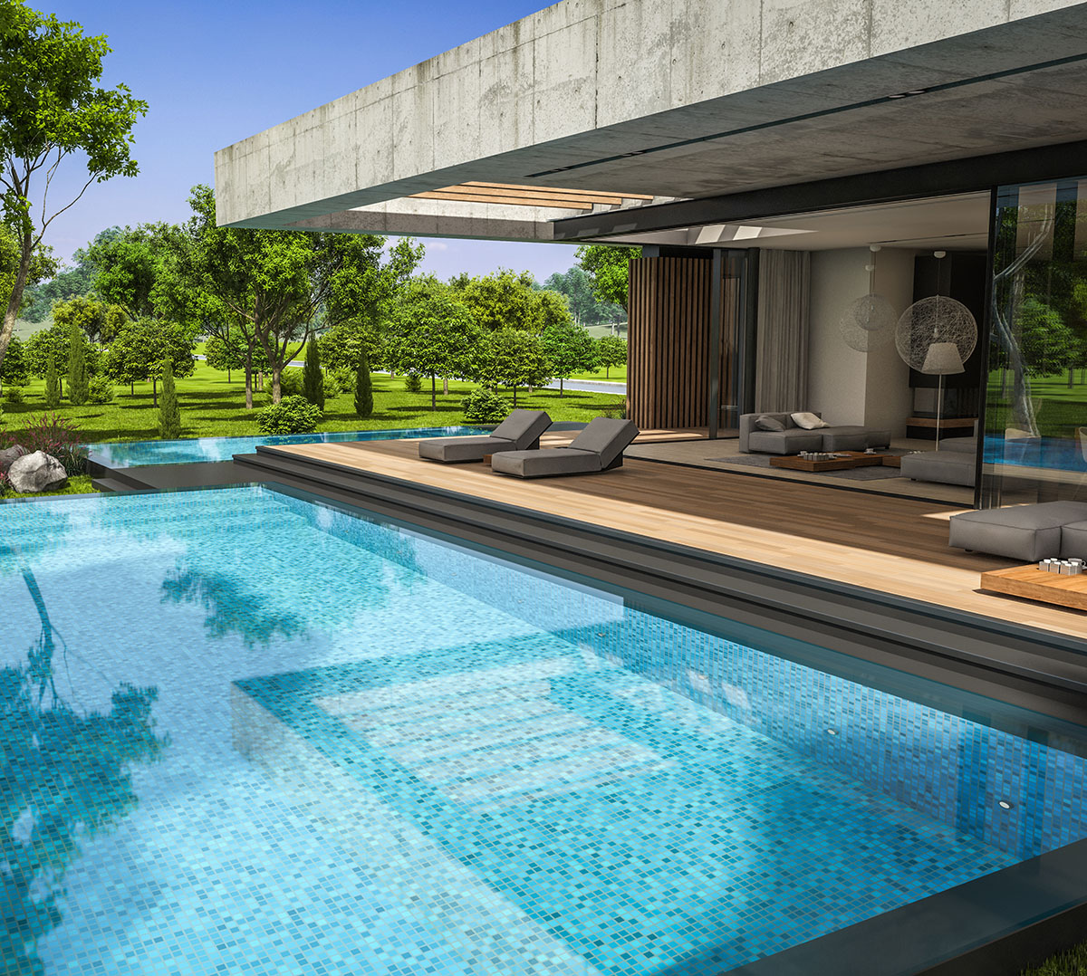 Concrete house in modern style with a pool during sunny day with clear blue sky
