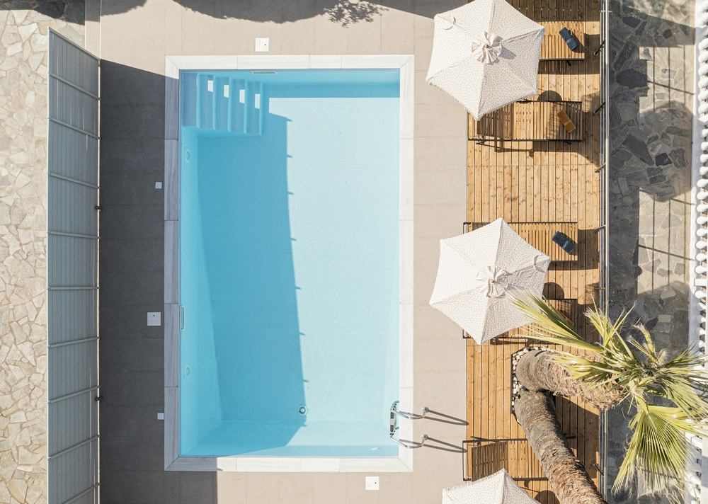 top down view of modern Portuguese villa with swimming pool