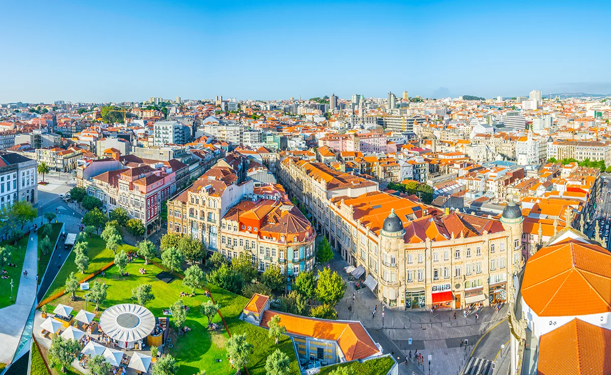 Scenic aerial view of historic Porto city center rooftops from Clerigos Tower, Portugal