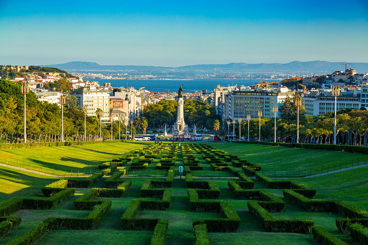 Eduardo VII Park in Lisbon with geometric hedges looking towards Marques de Pombal square