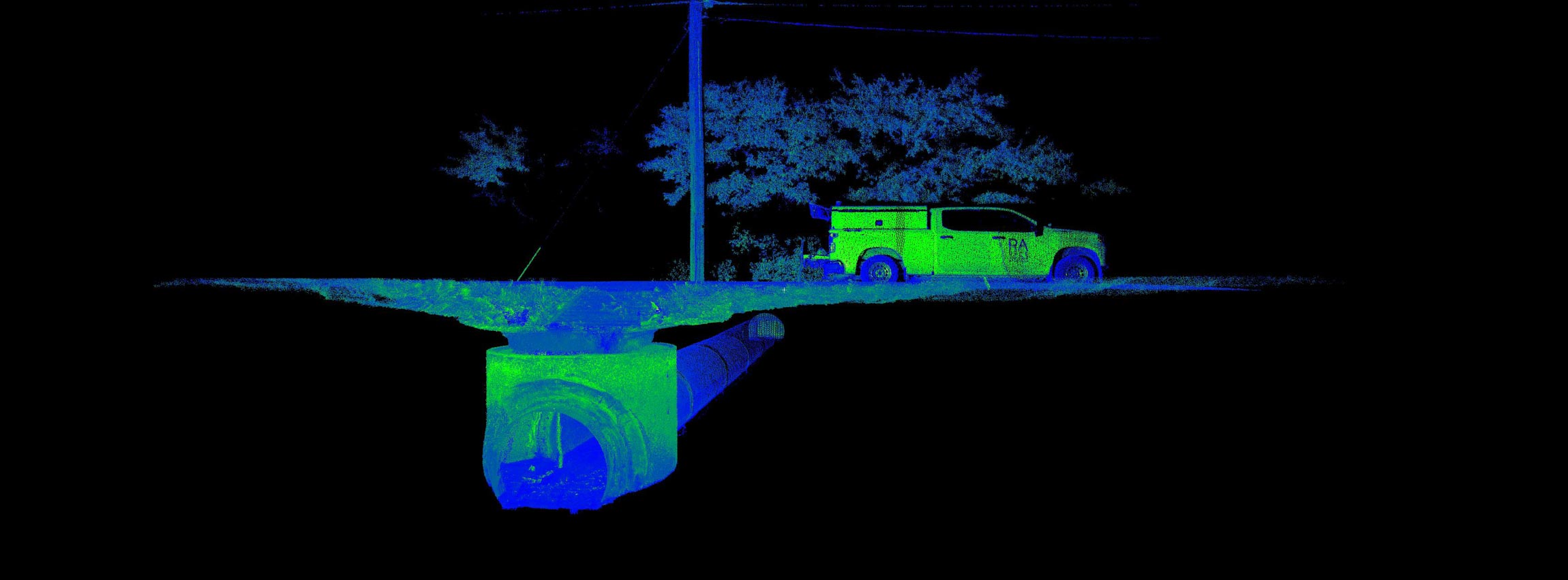 3D laser scan image showing an underground drainage pipe leading to a manhole with a truck and trees on the surface.