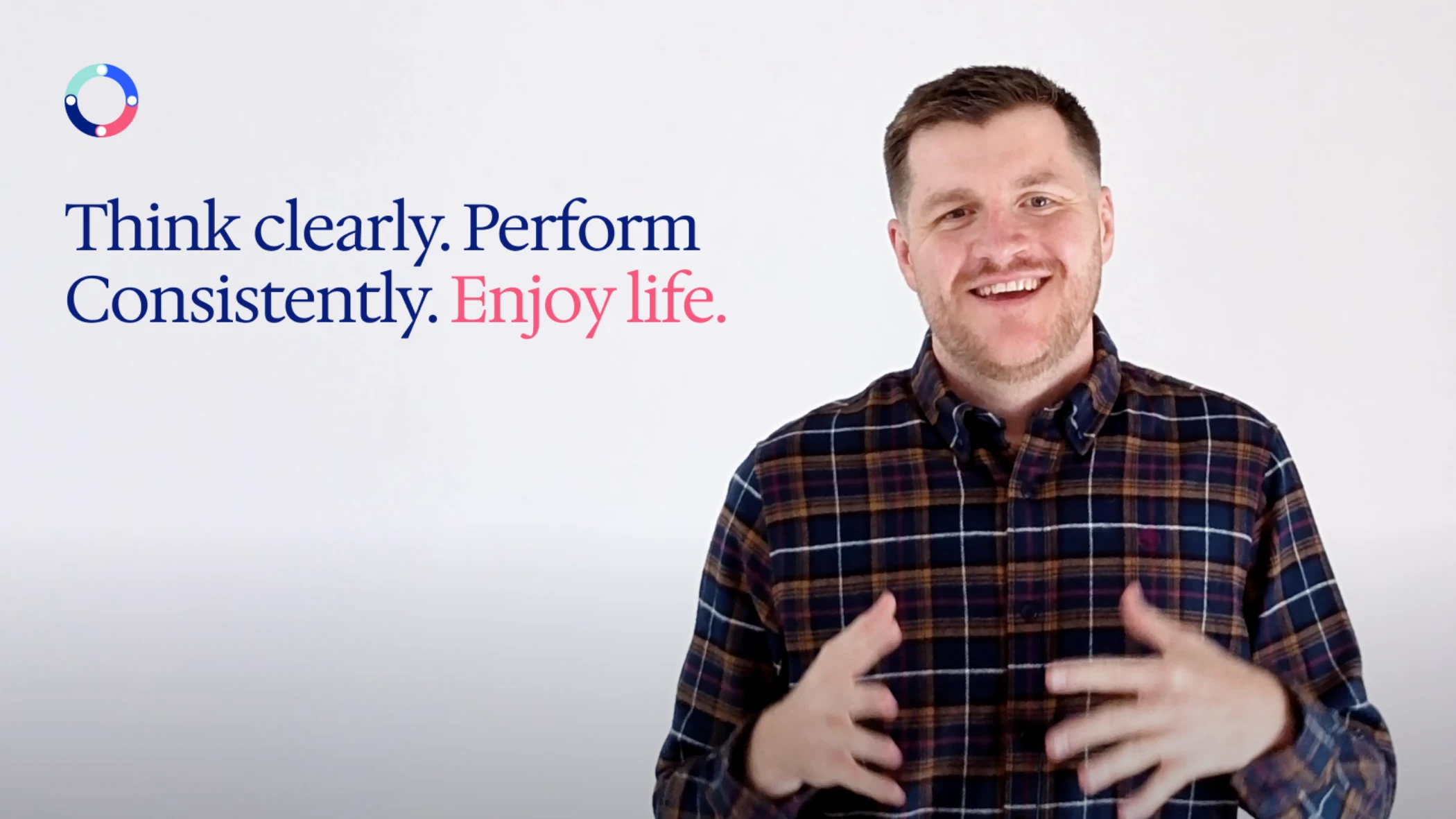 Smiling man in plaid shirt with motivational text about thinking clearly