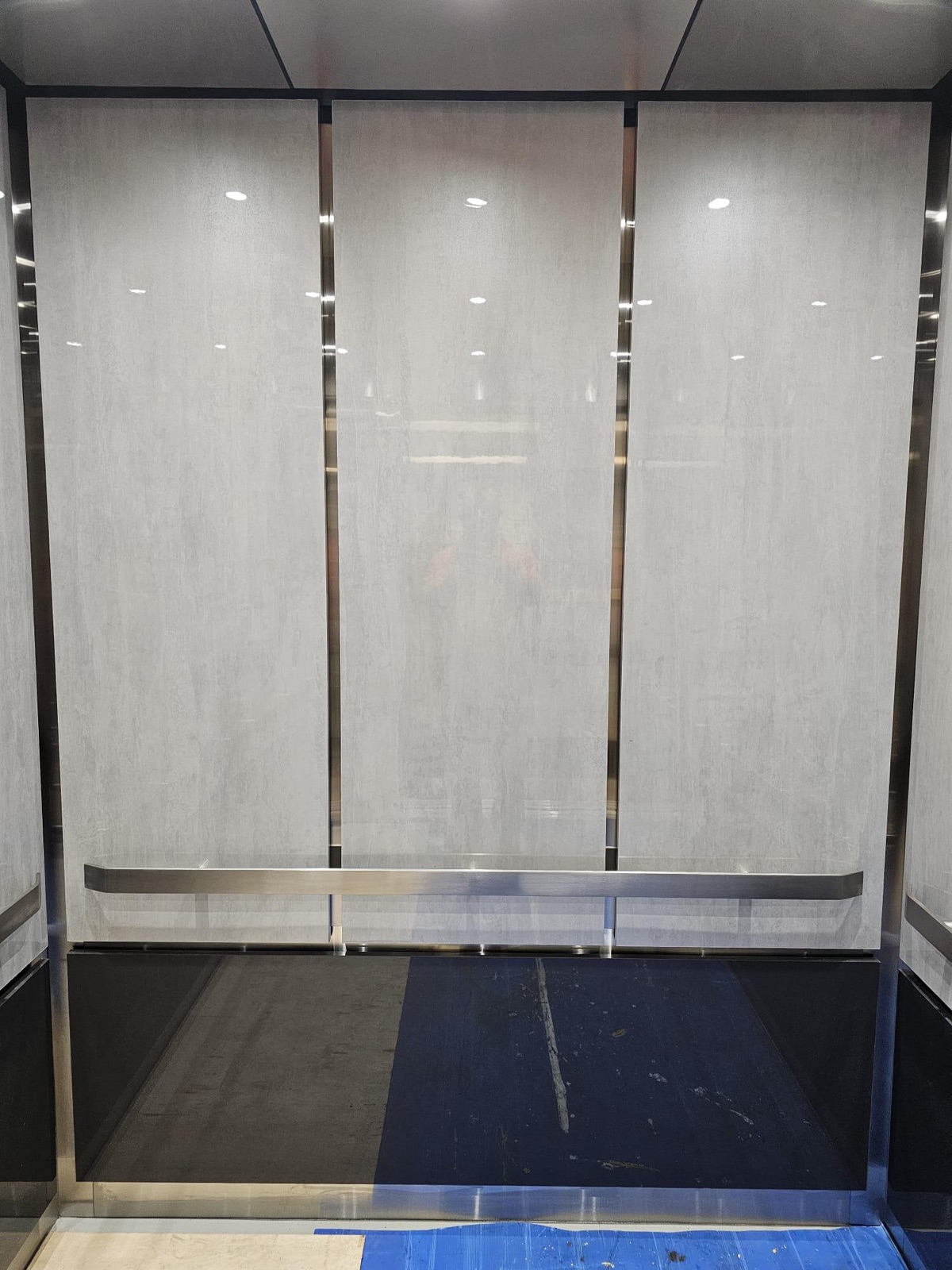Modernized elevator cab with new ceiling and lighting at Hialeah Hospital