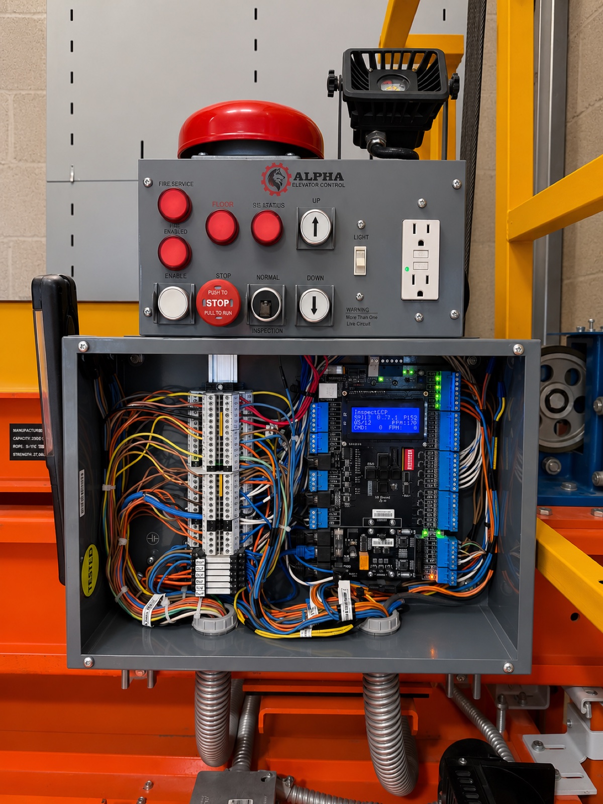 Alpha elevator control panel and controller wiring at the Bay of Pigs Museum