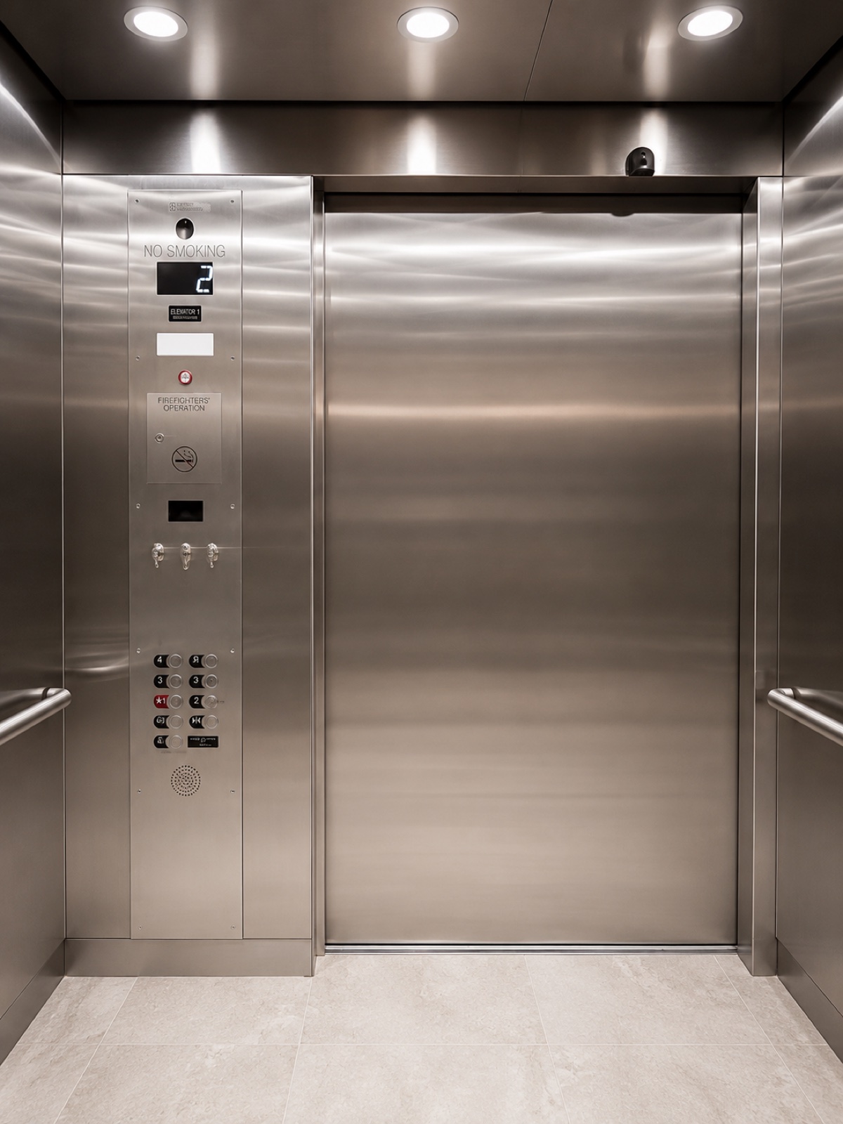 Stainless steel elevator cab interior at the Bay of Pigs Museum