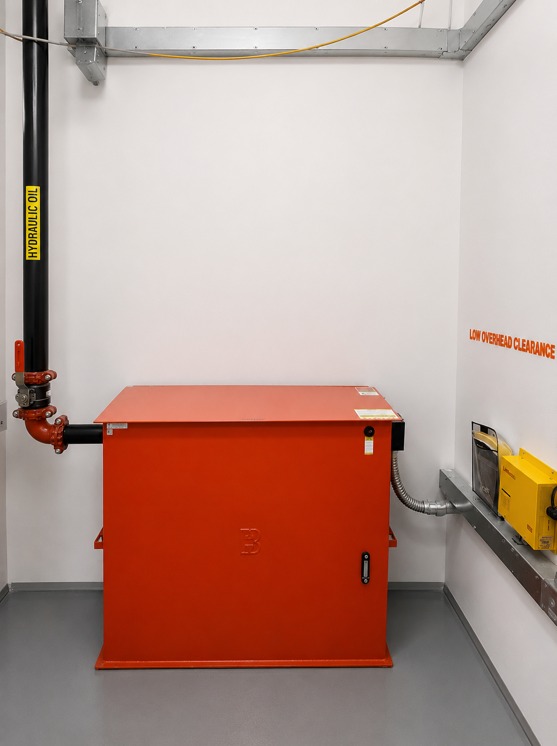 Hydraulic elevator power unit and oil piping installed in the machine room