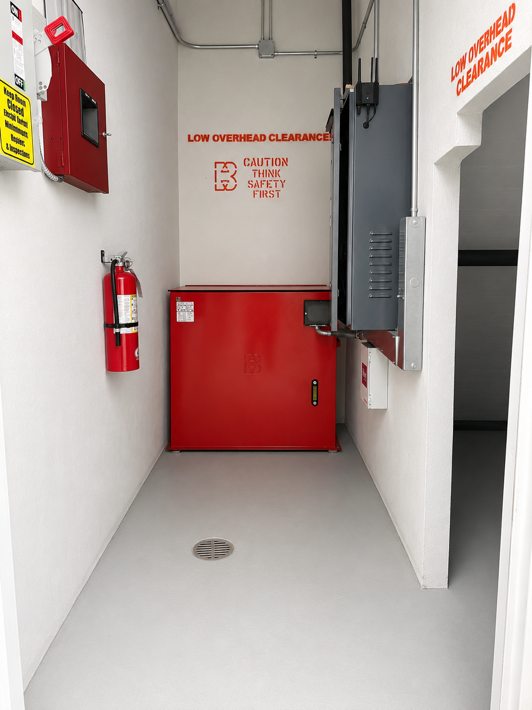 New red Brouss hydraulic elevator power unit in the refurbished machine room at 9550 Concourse in Bay Harbor Islands