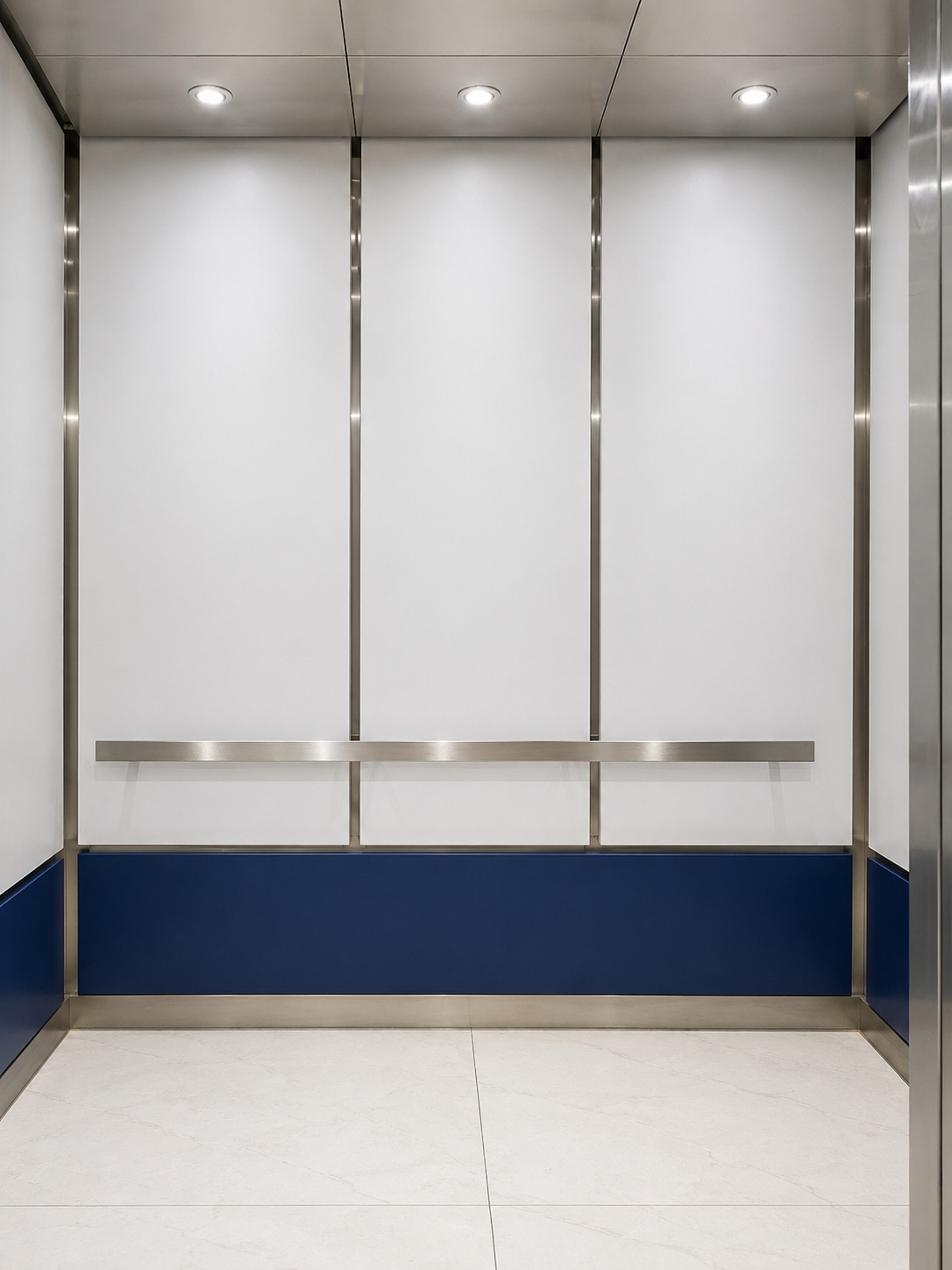 Renovated elevator cab interior with white panels, stainless trim and blue base at Rivero Diagnostic Center in Hialeah