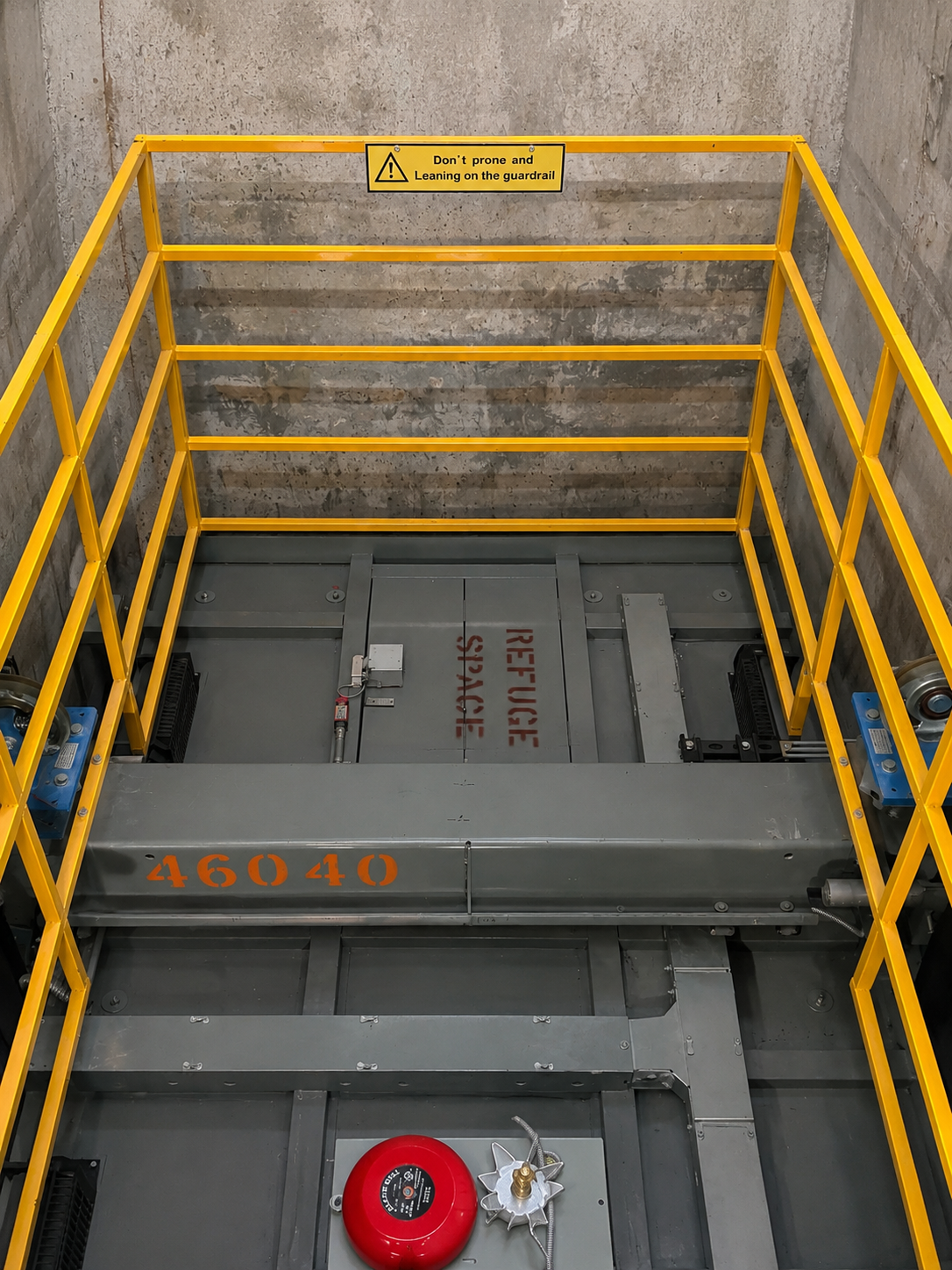 Elevator pit with counterweight buffers, safety guardrail and refuge space at Clima Home