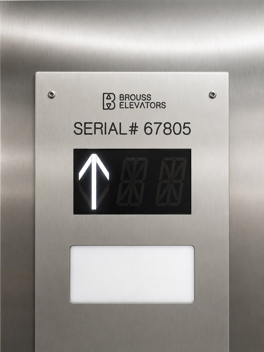 Brouss Elevators stainless position indicator with direction arrow at Chalet East Condominium