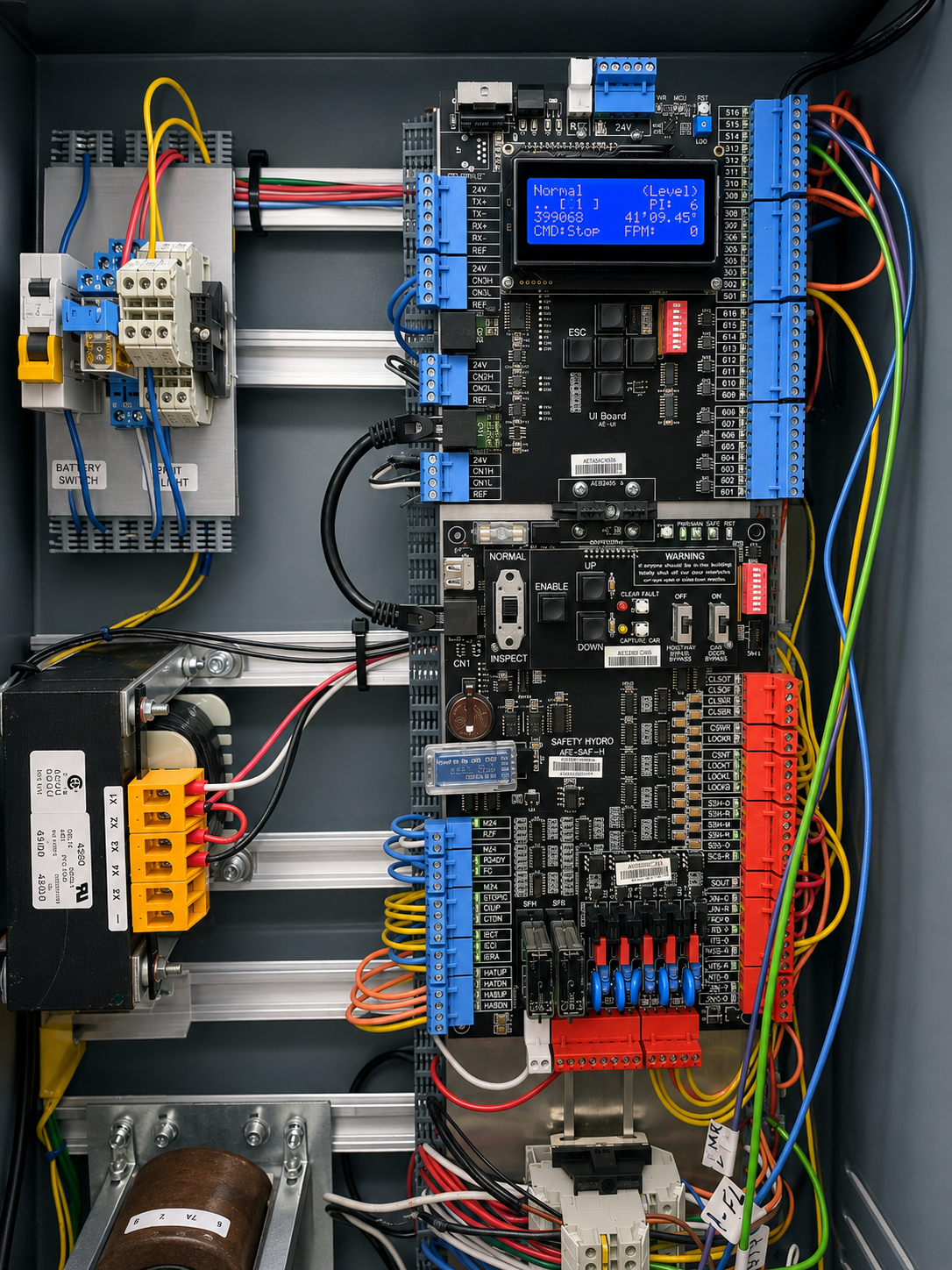 New elevator controller with control boards and color coded wiring at Lake Condominium in Miami-Dade