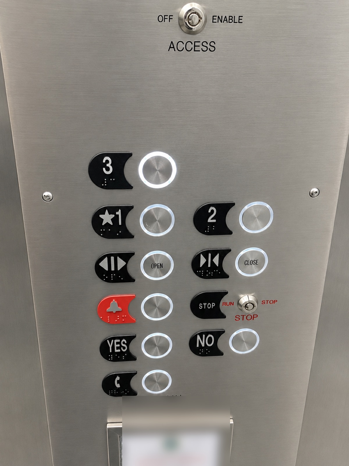 Elevator car operating panel buttons and fixtures at Lakeside Commons