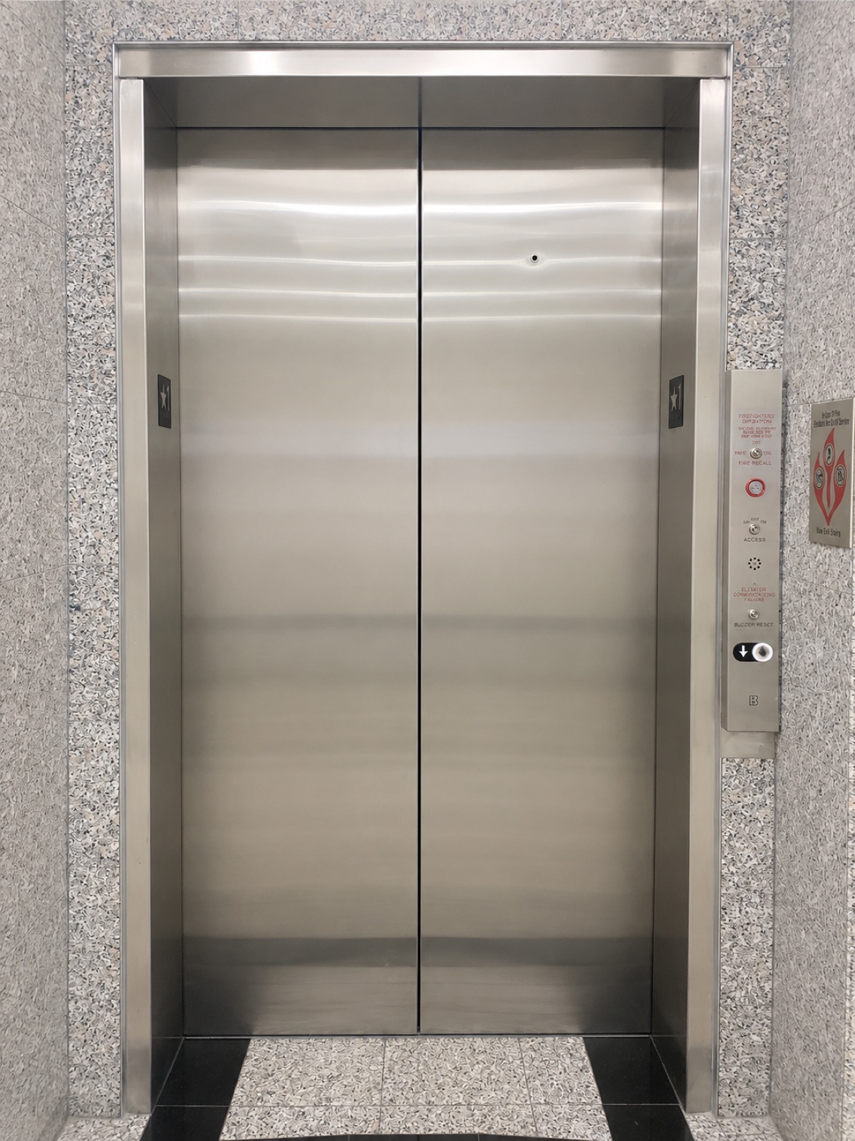 Stainless elevator entrance with the fire operation station at Lakeside Commons