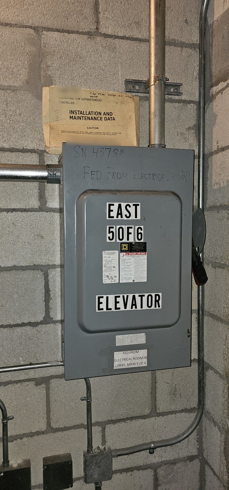 Elevator power disconnect labeled East 5 of 6 in the electrical room at The Wynwood Lofts