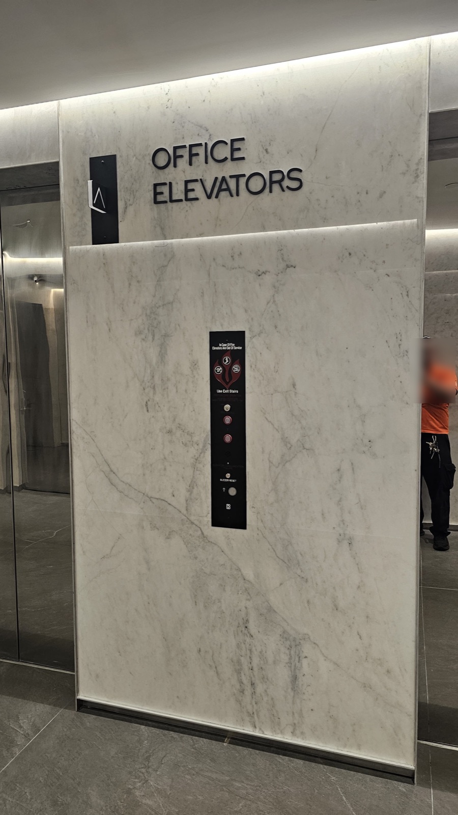 Office elevators lobby with the fire operation hall station at 121 Alhambra
