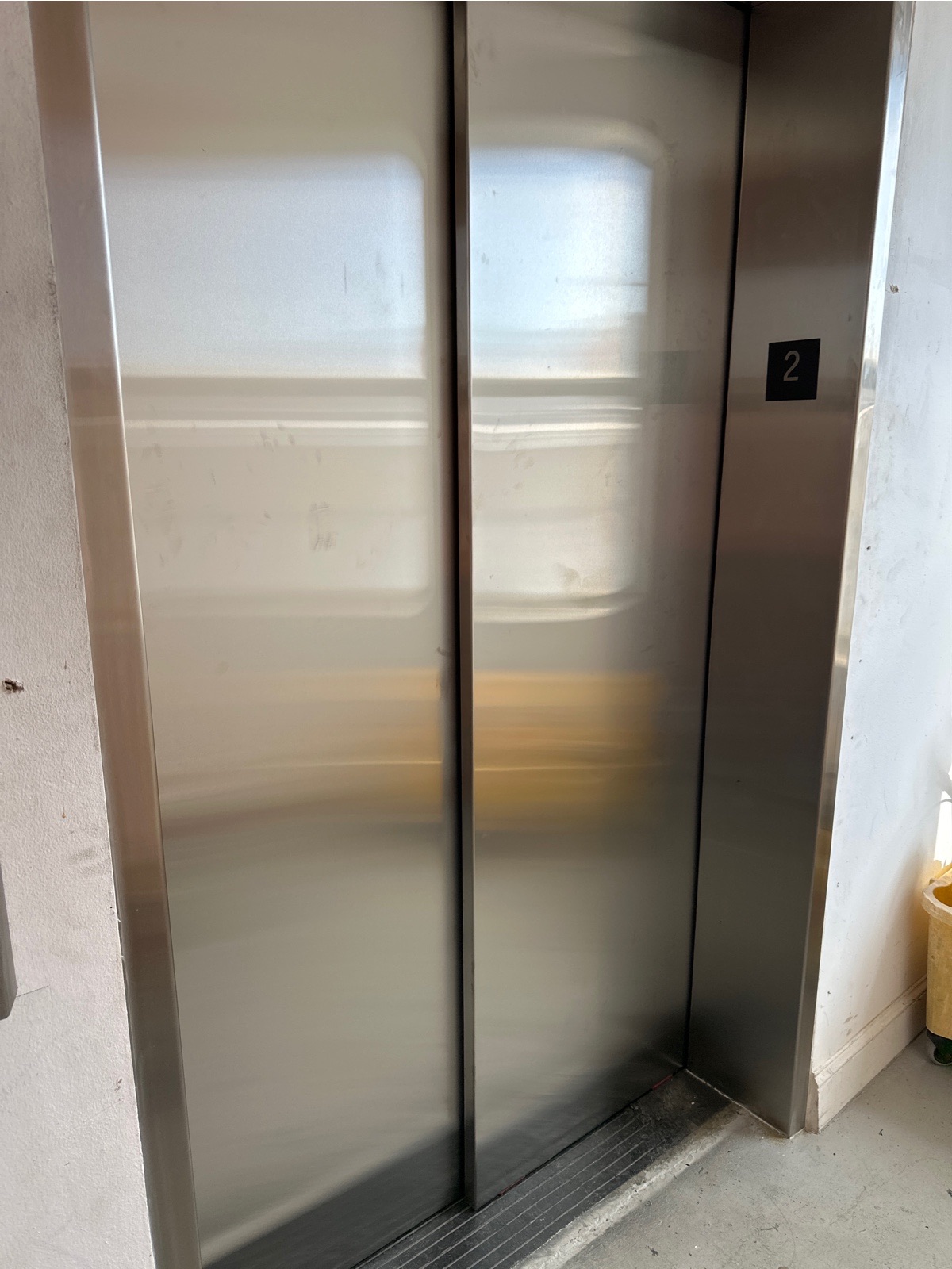 Stainless steel elevator entrance on the second floor at 2115 Hollywood Building