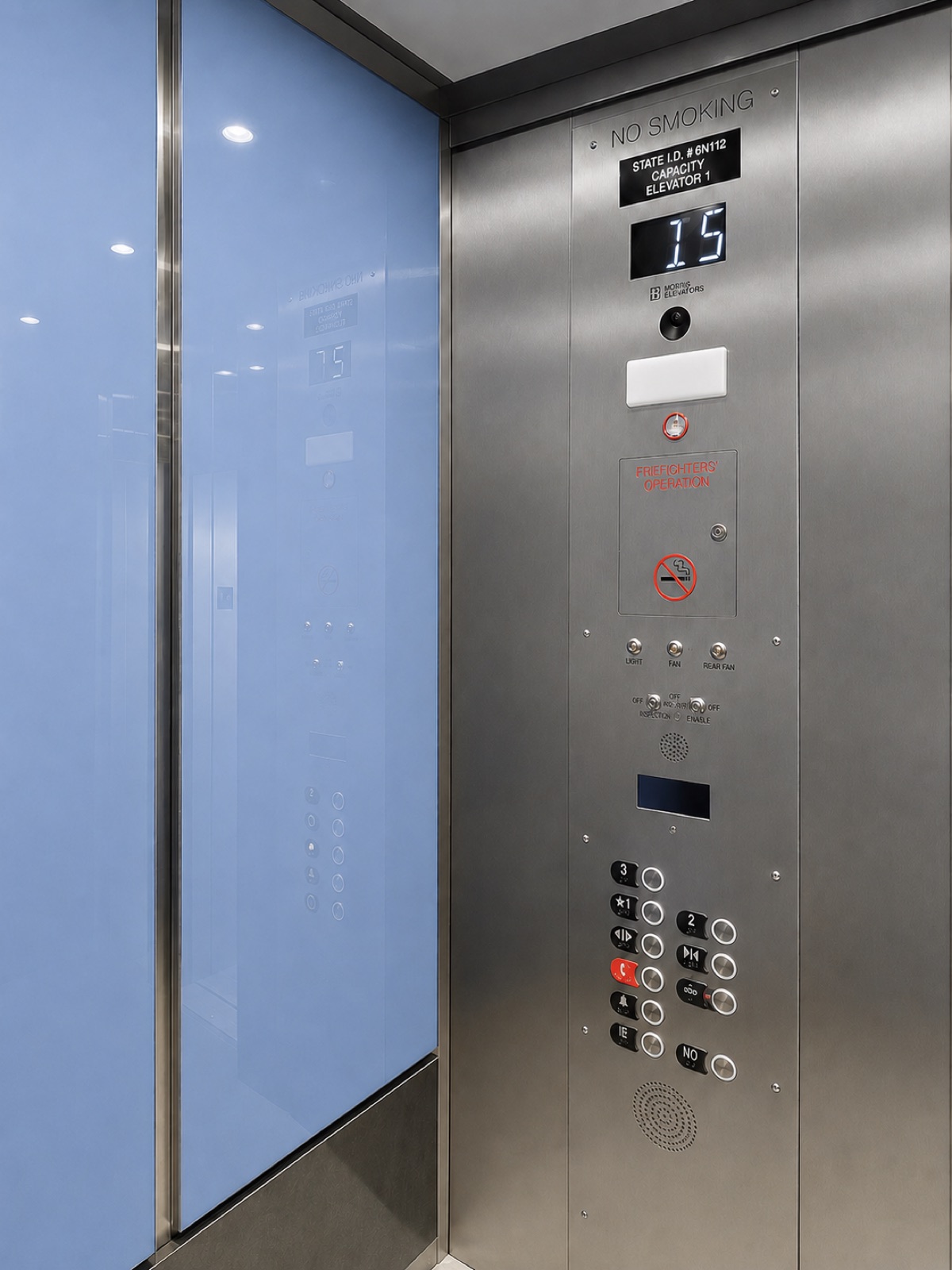 Elevator car operating panel and fixtures inside the modernized cab at Prestige District in North Miami