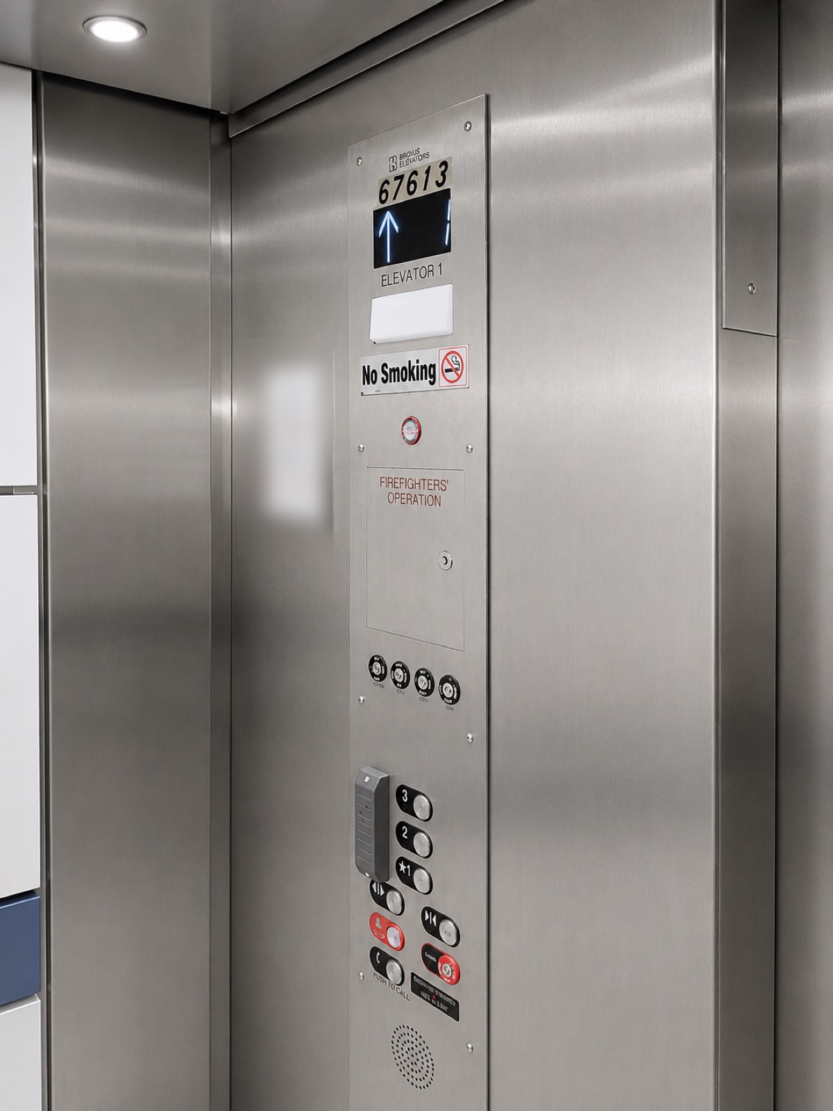 New elevator car operating panel with Brouss branding at Girosol Corporation Office