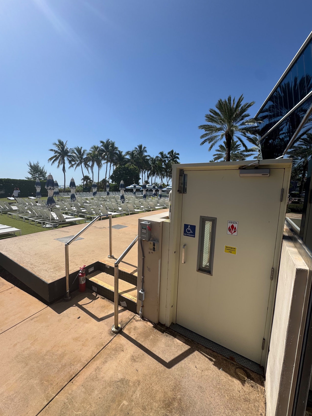 New ADA wheelchair platform lift at the Fontainebleau Miami Beach pool deck