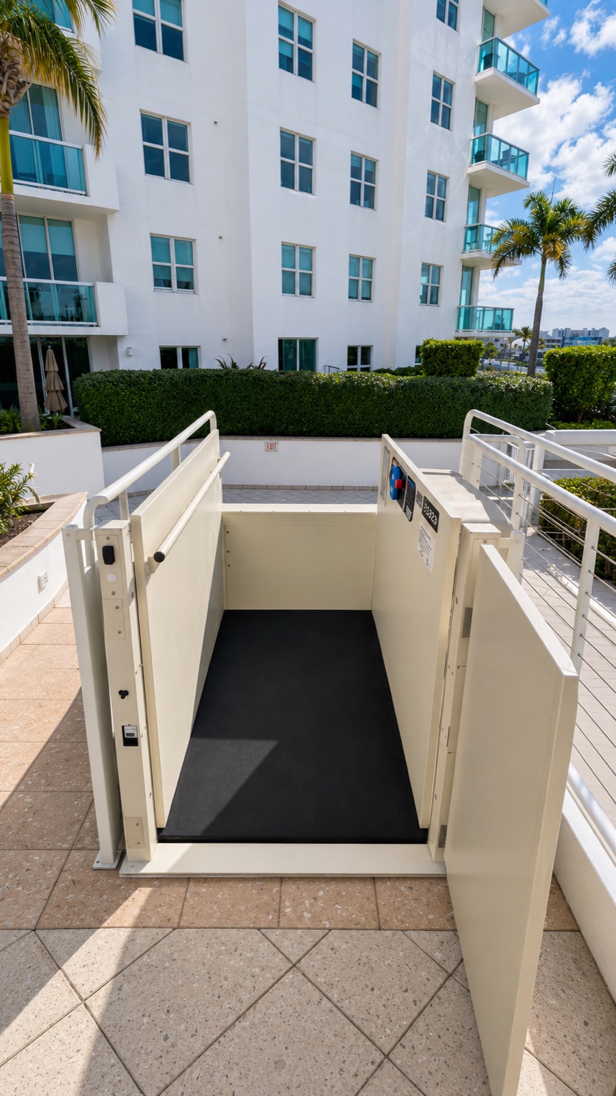 Open platform of the ADA-compliant straight-thru lift modernized by Brouss Elevators at North Bay Village