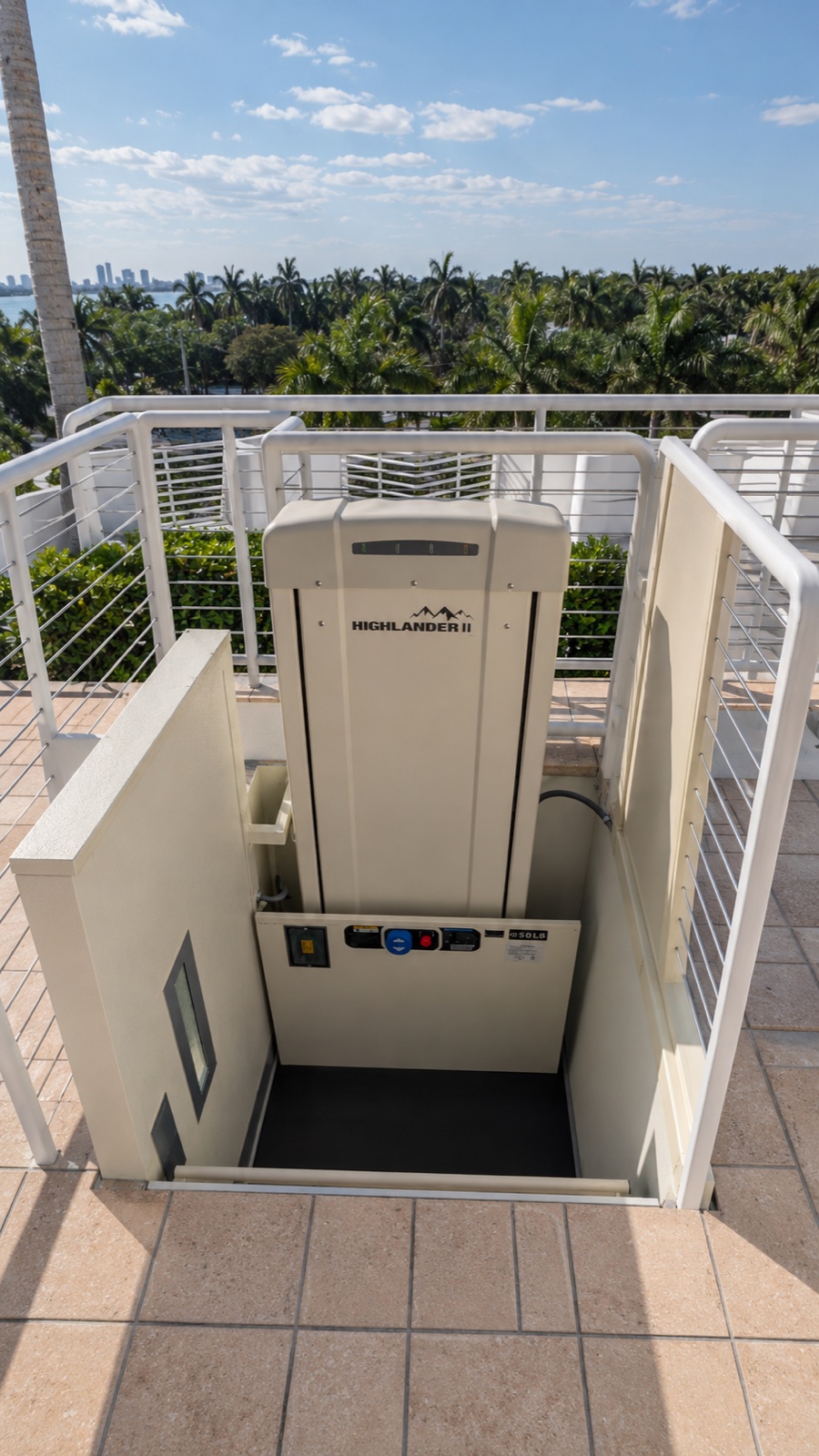 ADA straight-thru platform lift installed at the waterfront residential building in North Bay Village