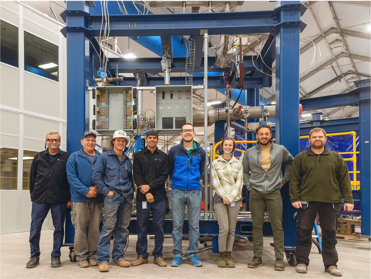 Team photo inside plant