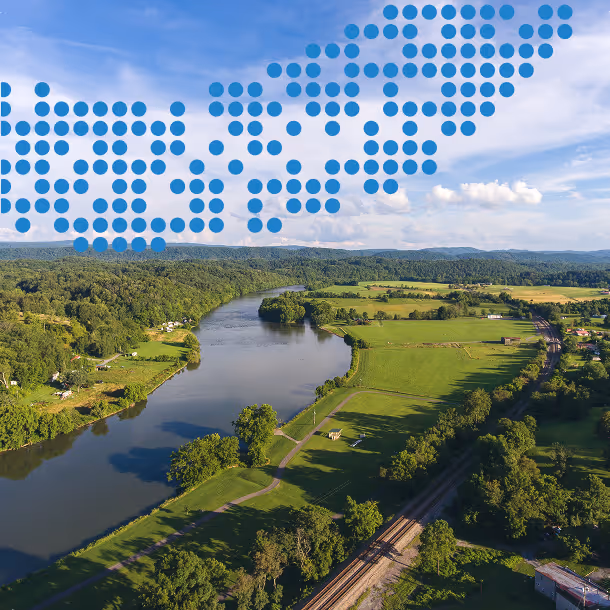 Decorative view of river running through greenspace with graphic overlay