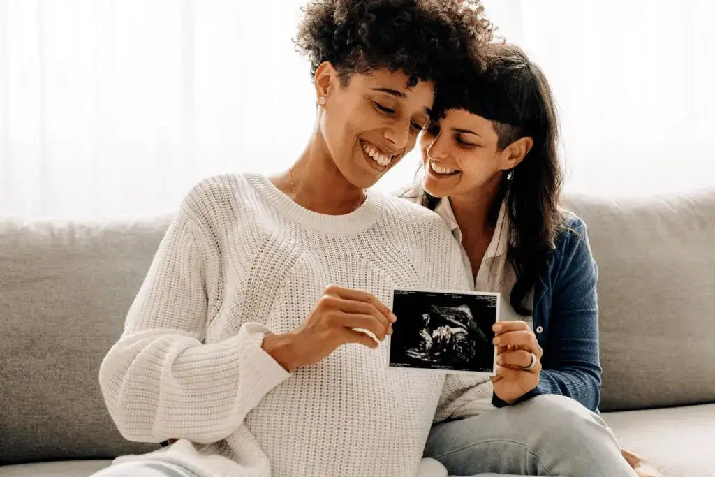 lgbtq fertility couple looking at ultrasound