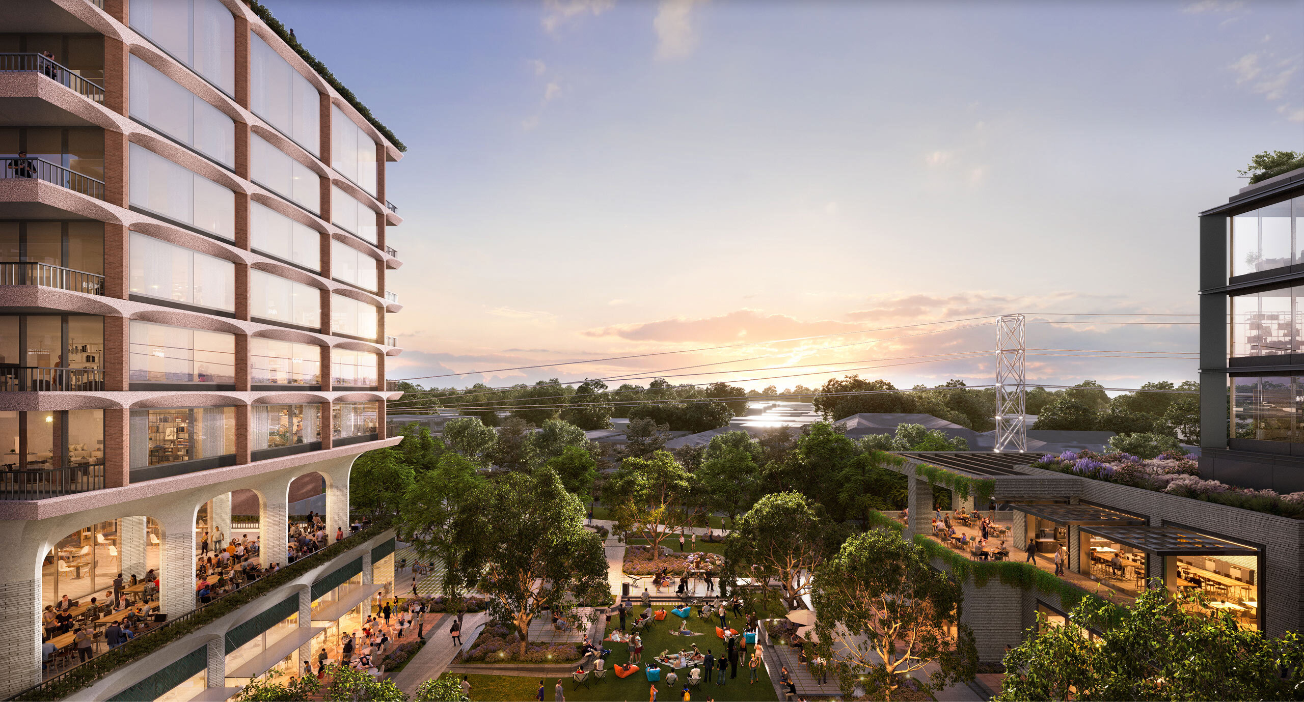 Sunset view of a modern urban park surrounded by office buildings with people socializing on the lawn and terraces.