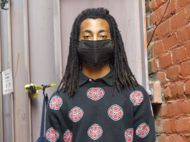 Photo of intern Omar ali with mask on