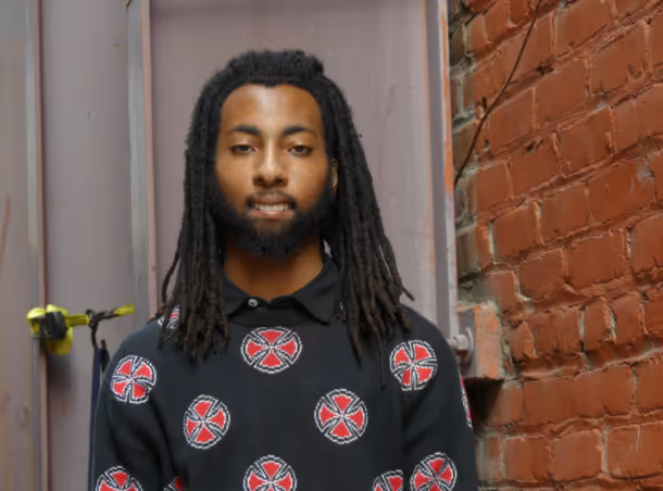 Photo of intern Omar ali with mask off