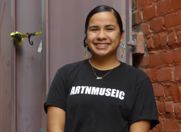 Photo of intern Abigail Armendaris with mask off